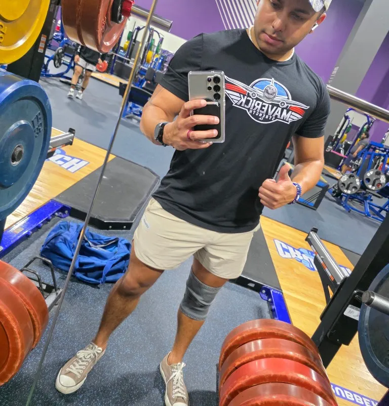 Powerlifter completing a deadlift at USPA competition